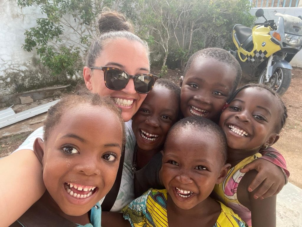 student with kids in ghana