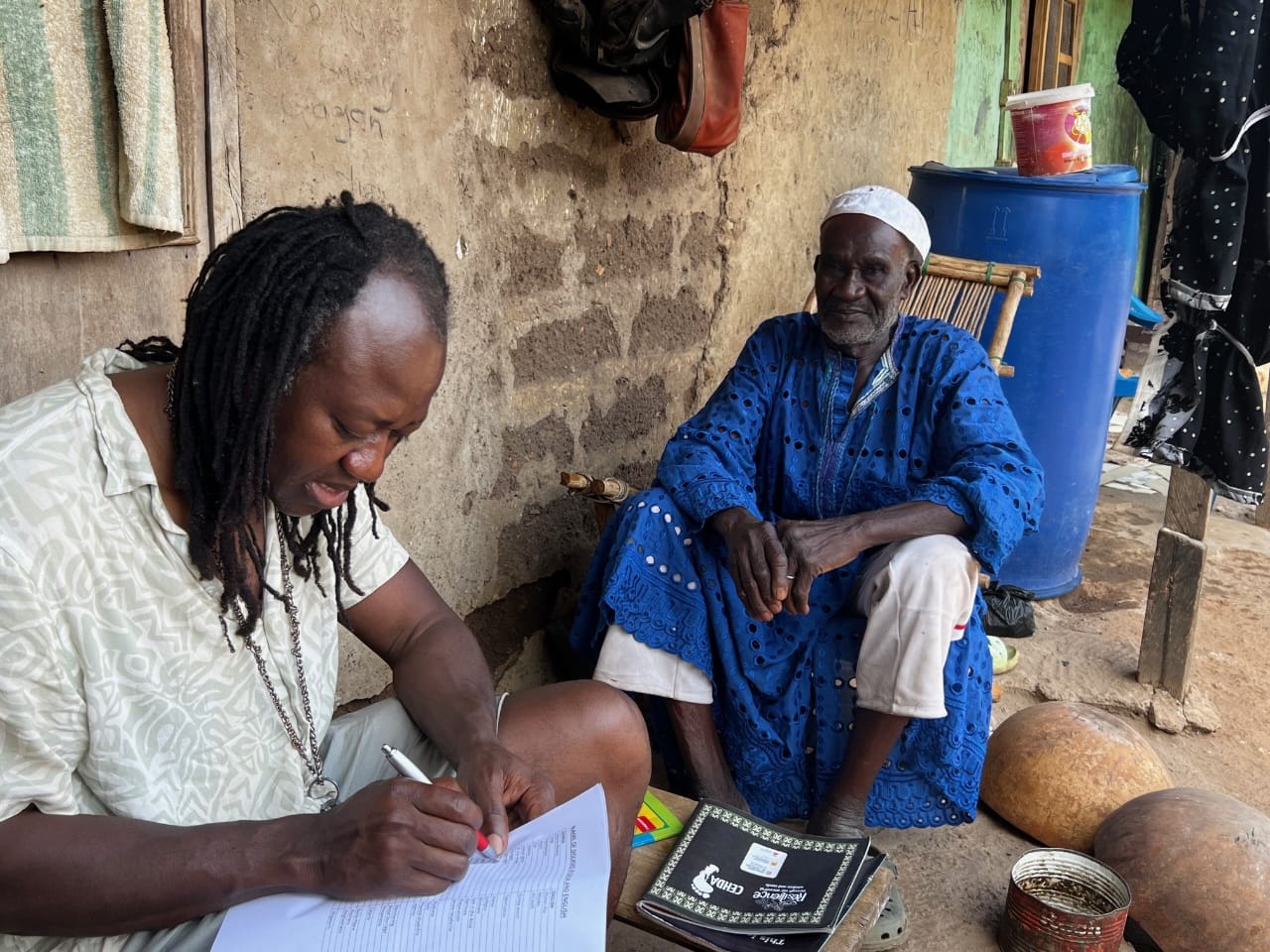 WIACT researcher documenting traditional knowledge from a community elder in northern Ghana
